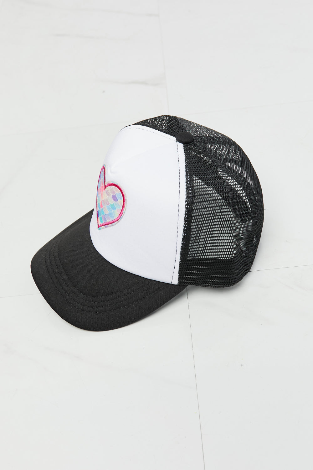 Falling For You Trucker Hat in Black