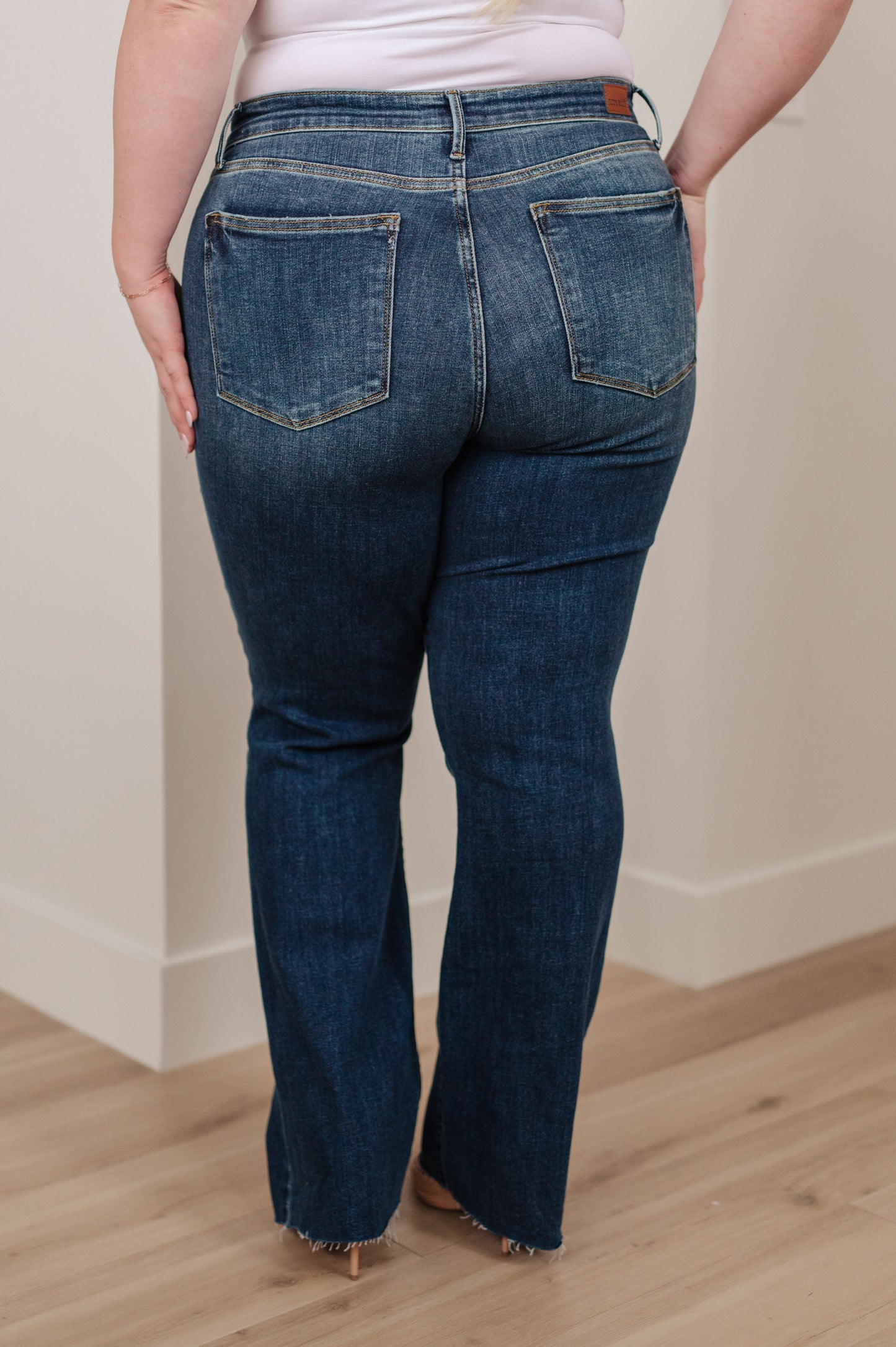 Josephine Mid Rise Raw Hem Bootcut Jeans by Judy Blue